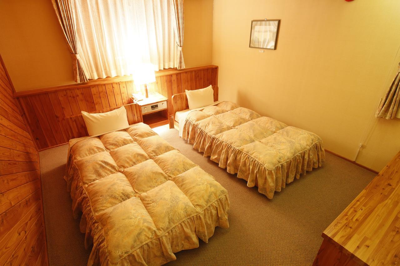 Log Hotel Larch Lake Kanayama Minamifurano Quarto foto