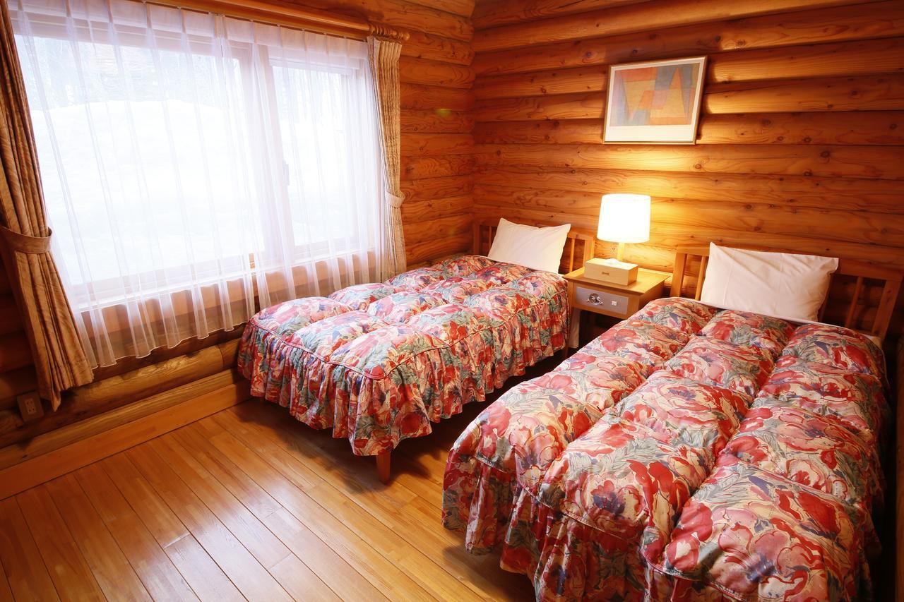 Log Hotel Larch Lake Kanayama Minamifurano Quarto foto