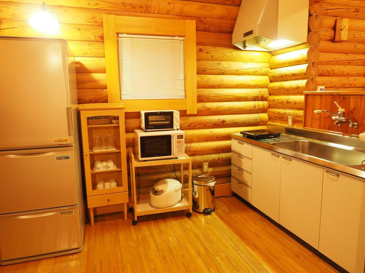Log Hotel Larch Lake Kanayama Minamifurano Quarto foto