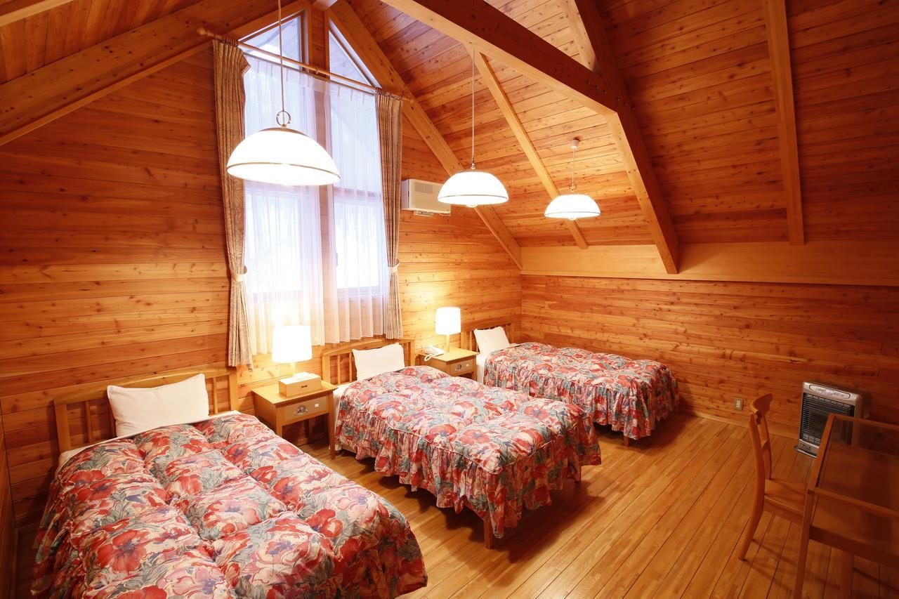 Log Hotel Larch Lake Kanayama Minamifurano Quarto foto