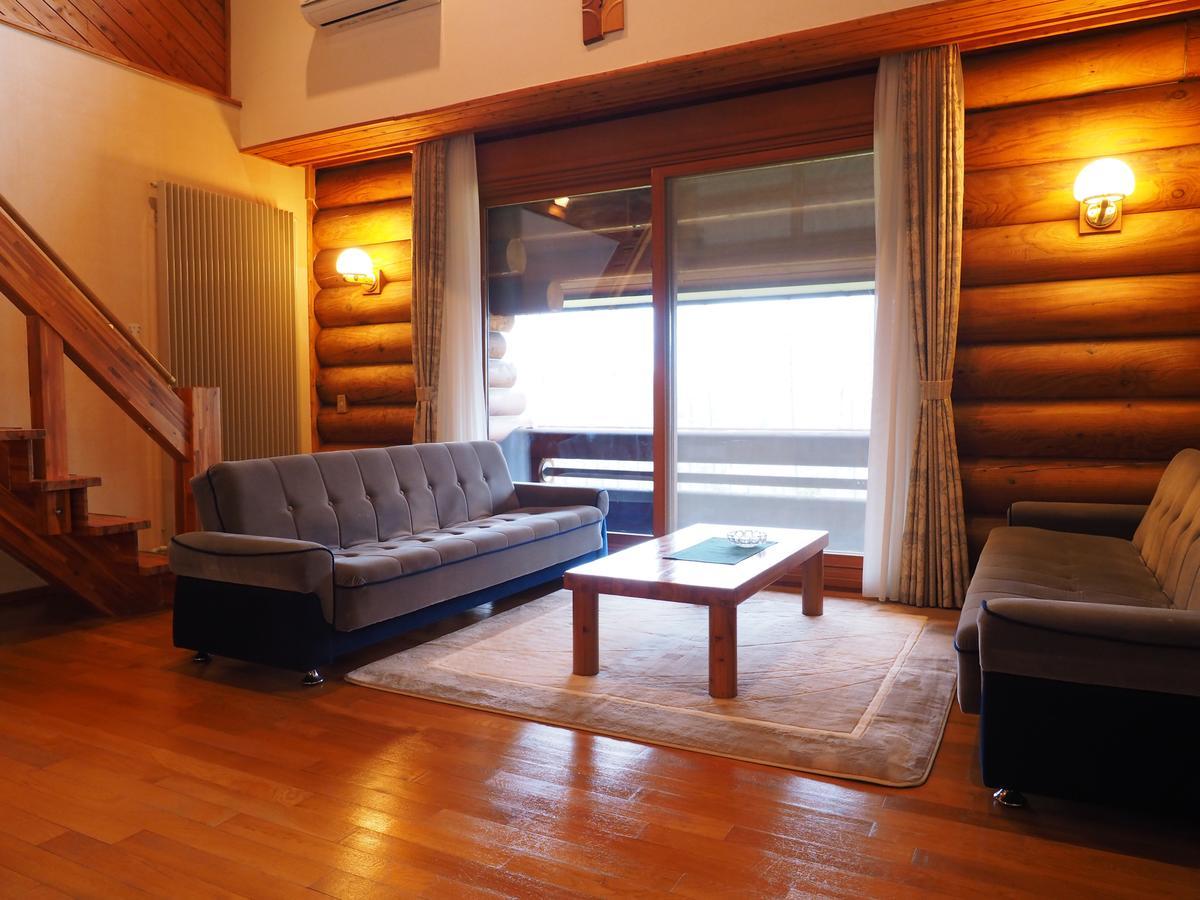 Log Hotel Larch Lake Kanayama Minamifurano Quarto foto